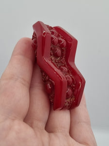 1940s Chunky Red Textured Bakelite Dress Clip