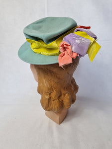 1940s Pale Blue Felt Tilt Hat With Yellow, Pink and Lilac Velvet Bows