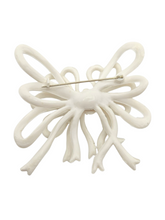 Load image into Gallery viewer, 1940s White Huge Celluloid Bow Brooch
