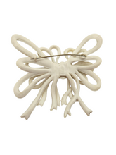 Load image into Gallery viewer, 1940s Cream Huge Celluloid Bow Brooch
