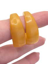 Load image into Gallery viewer, 1940s Yellow Marbled Bakelite Hoop Earrings
