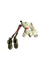 Load image into Gallery viewer, 1940s Celluloid Dog and Walking Boots Brooch
