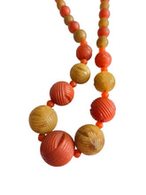 Load image into Gallery viewer, 1940s Dark Orange and Olive Green Galalith Necklace
