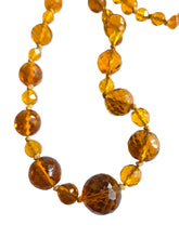 Load image into Gallery viewer, 1930s Long Orange Faceted Glass Necklace
