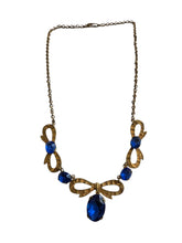 Load image into Gallery viewer, 1910s/1920s American Blue Open Back Glass Metal Necklace
