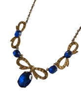 Load image into Gallery viewer, 1910s/1920s American Blue Open Back Glass Metal Necklace
