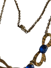 Load image into Gallery viewer, 1910s/1920s American Blue Open Back Glass Metal Necklace
