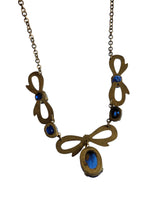 Load image into Gallery viewer, 1910s/1920s American Blue Open Back Glass Metal Necklace
