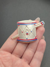 Load image into Gallery viewer, 1940s World War Two Celluloid US Drum Brooch
