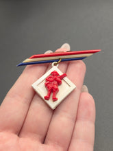 Load image into Gallery viewer, 1940s World War Two Red, White and Blue Celluloid Soldier Brooch
