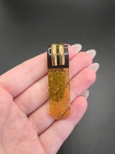Load image into Gallery viewer, 1940s Rare Apple Juice and Black Bakelite Confetti Dress Clip
