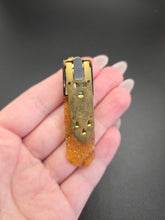 Load image into Gallery viewer, 1940s Rare Apple Juice and Black Bakelite Confetti Dress Clip

