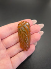 Load image into Gallery viewer, 1940s Green/Orange Chunky Carved Bakelkte Dress Clip
