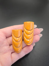 Load image into Gallery viewer, 1940s Egg Yolk Carved Bakelite Dress Clip Set
