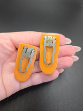 Load image into Gallery viewer, 1940s Egg Yolk Carved Bakelite Dress Clip Set
