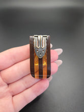 Load image into Gallery viewer, 1940s Brown and Apple Juice Laminated Bakelite Dress Clip
