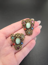 Load image into Gallery viewer, 1930s Czech Mint Satin Glass And Filigree Dress Clip Set

