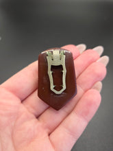 Load image into Gallery viewer, 1940s Chunky Carved Bakelite Maroon Dress Clip
