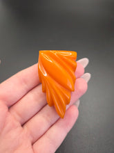Load image into Gallery viewer, 1940s Chunky Carved Bakelite Egg Yolk Dress Clip
