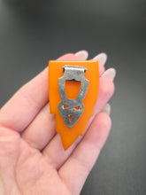 Load image into Gallery viewer, 1940s Chunky Carved Bakelite Egg Yolk Dress Clip
