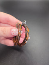 Load image into Gallery viewer, 1940s Marbled Brown Carved Bakelite Hoop Earrings
