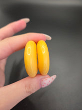 Load image into Gallery viewer, 1940s Buttermilk Yellow Bakelite Hoop Earrings
