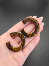 Load image into Gallery viewer, 1940s Big Brown Marbled Bakelite Hoop Earrings
