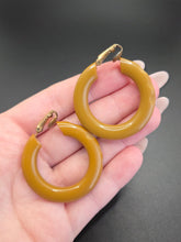 Load image into Gallery viewer, 1940s Olive Green/Mustard Carved Bakelite Earrings
