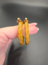 Load image into Gallery viewer, 1940s Olive Green/Mustard Carved Bakelite Earrings

