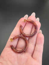Load image into Gallery viewer, 1940s Brown Bakelite and Wire Hoop Earrings
