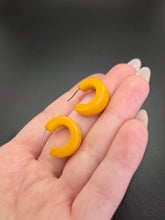 Load image into Gallery viewer, 1940s Dark Yellow Bakelite Hoop Earrings
