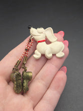 Load image into Gallery viewer, 1940s Celluloid Dog and Walking Boots Brooch
