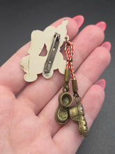 Load image into Gallery viewer, 1940s Celluloid Dog and Walking Boots Brooch
