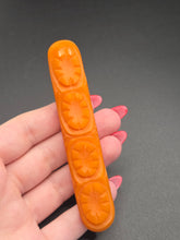 Load image into Gallery viewer, 1940s Orange Carved Bakelite Bar Brooch
