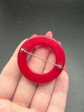 Load image into Gallery viewer, 1940s Red Carved Bakelite Circle Brooch
