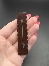 Load image into Gallery viewer, 1940s Chocolate Brown Carved Bakelite Bar Brooch

