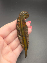 Load image into Gallery viewer, 1940s Thick Brown and Green Marbled Bakelite Feather Brooch
