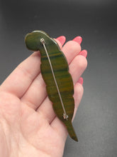 Load image into Gallery viewer, 1940s Thick Brown and Green Marbled Bakelite Feather Brooch
