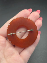 Load image into Gallery viewer, 1940s Rust Bakelite Carved Circle Brooch
