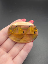Load image into Gallery viewer, 1940s Carved Apple Juice Bakelite Boat Brooch
