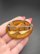 Load image into Gallery viewer, 1940s Carved Apple Juice Bakelite Boat Brooch

