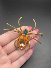Load image into Gallery viewer, Edwardian Orange and Blue Glass Spider Brooch
