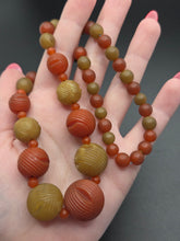 Load image into Gallery viewer, 1940s Dark Orange and Olive Green Galalith Necklace
