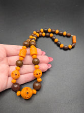 Load image into Gallery viewer, 1940s Orange and Brown Galalith Necklace
