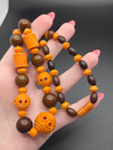 Load image into Gallery viewer, 1940s Orange and Brown Galalith Necklace
