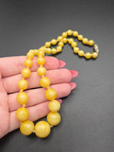 Load image into Gallery viewer, 1940s Bright Yellow Satin Glass Knotted Necklace

