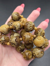 Load image into Gallery viewer, 1930s Brown Chunky Carved Galalith Necklace
