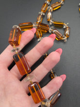 Load image into Gallery viewer, 1930s Long Root Beer Glass Necklace

