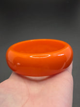 Load image into Gallery viewer, 1940s Chunky Bright Orange Bakelite Bangle

