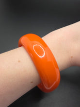 Load image into Gallery viewer, 1940s Chunky Bright Orange Bakelite Bangle

